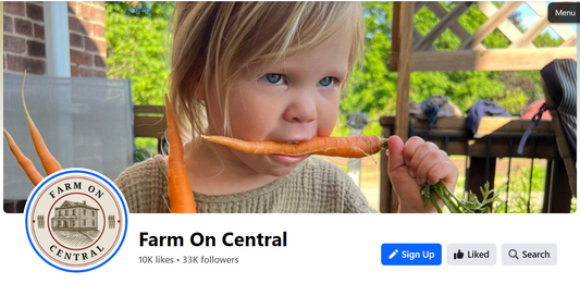 farm on central child eating carrots